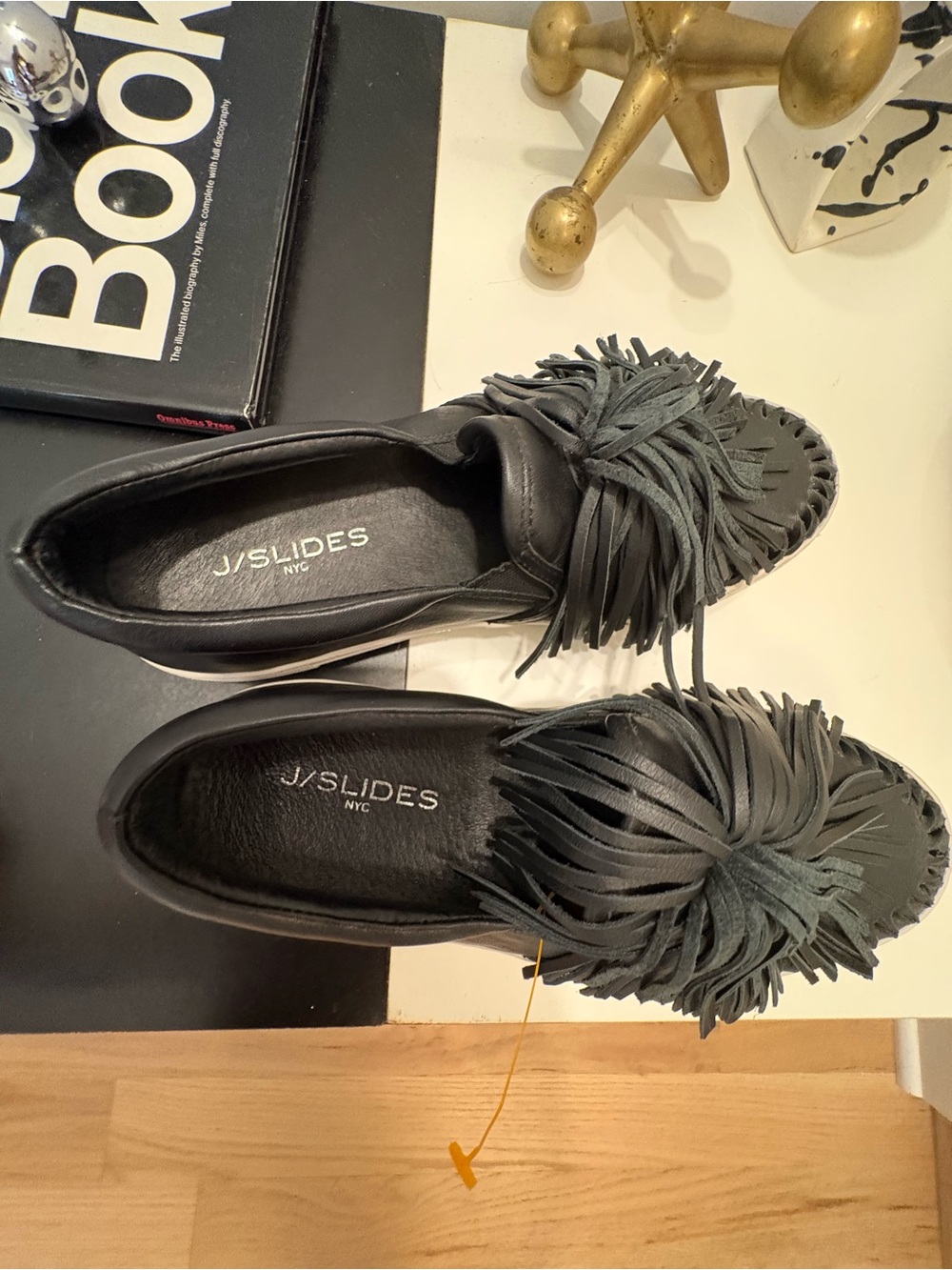 J/SLIDES Women’s Black Fringe Leather Loafers
